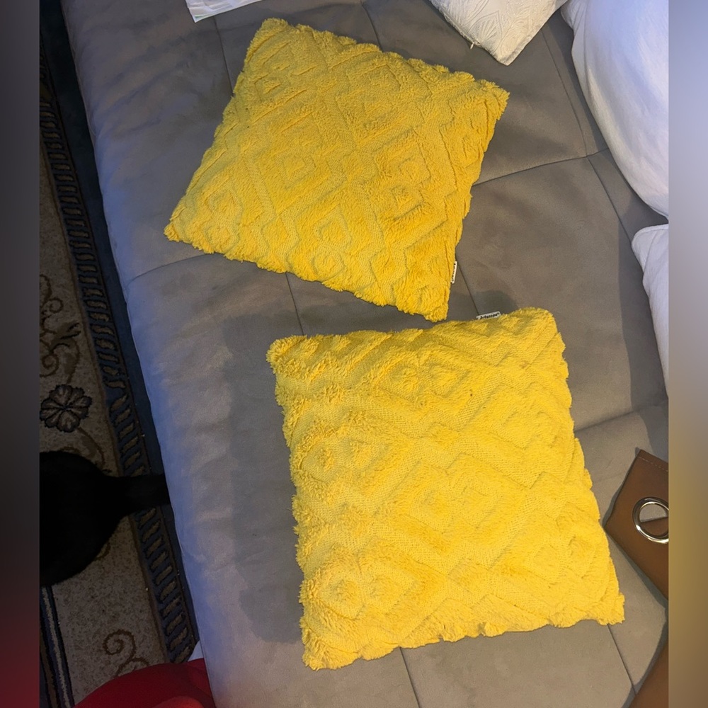 Two Yellow Textured Throw Pillows